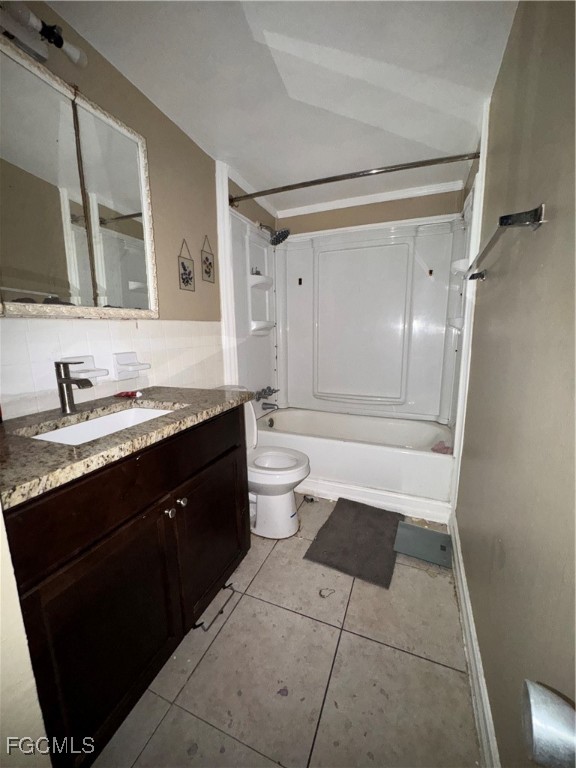 3724 Richard Road North Fort Myers, FL 33903 - Photo 14 of 17 a bathroom with a granite countertop sink toilet and shower