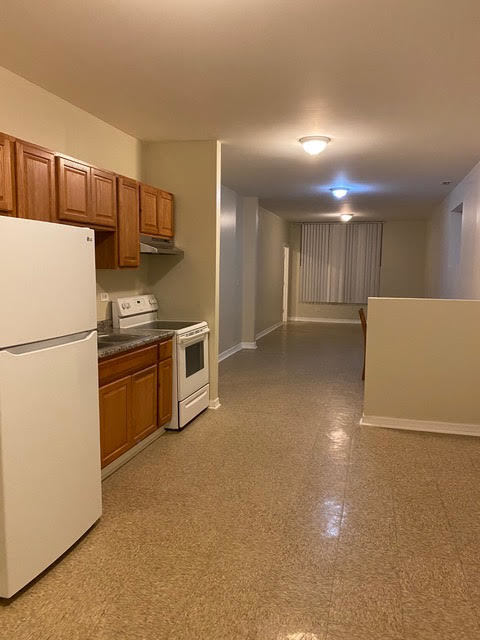 2931 North Rutherford Avenue Chicago, IL 60634 - Photo 23 of 37 a kitchen with stainless steel appliances a refrigerator and a stove top oven