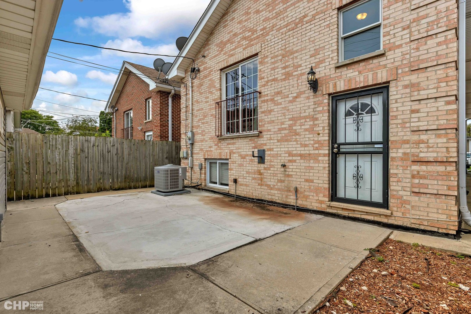 2931 North Rutherford Avenue Chicago, IL 60634 - Photo 34 of 37 a view of a brick house with many windows