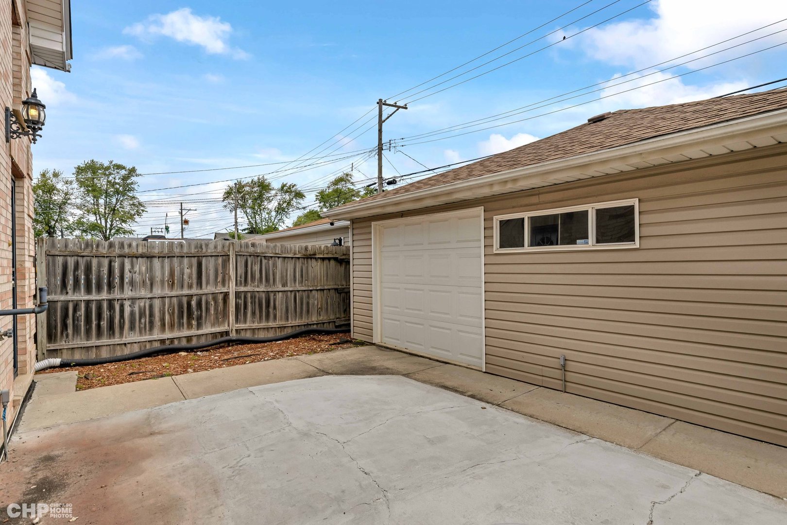 2931 North Rutherford Avenue Chicago, IL 60634 - Photo 36 of 37 a view of a house with a fence