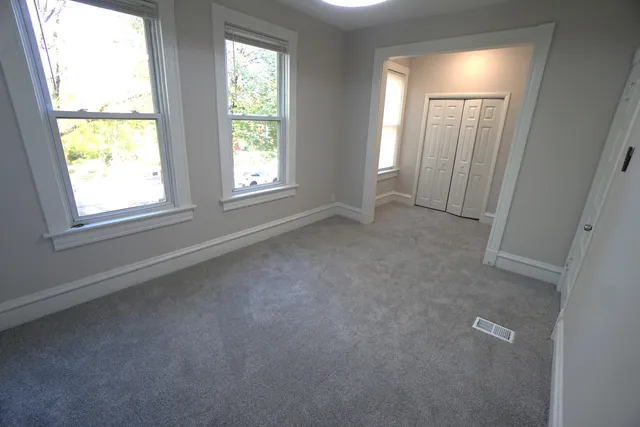 an empty room with windows