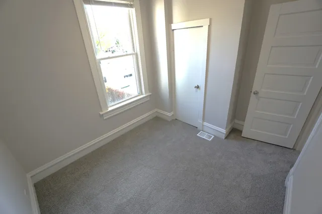 an empty room with windows