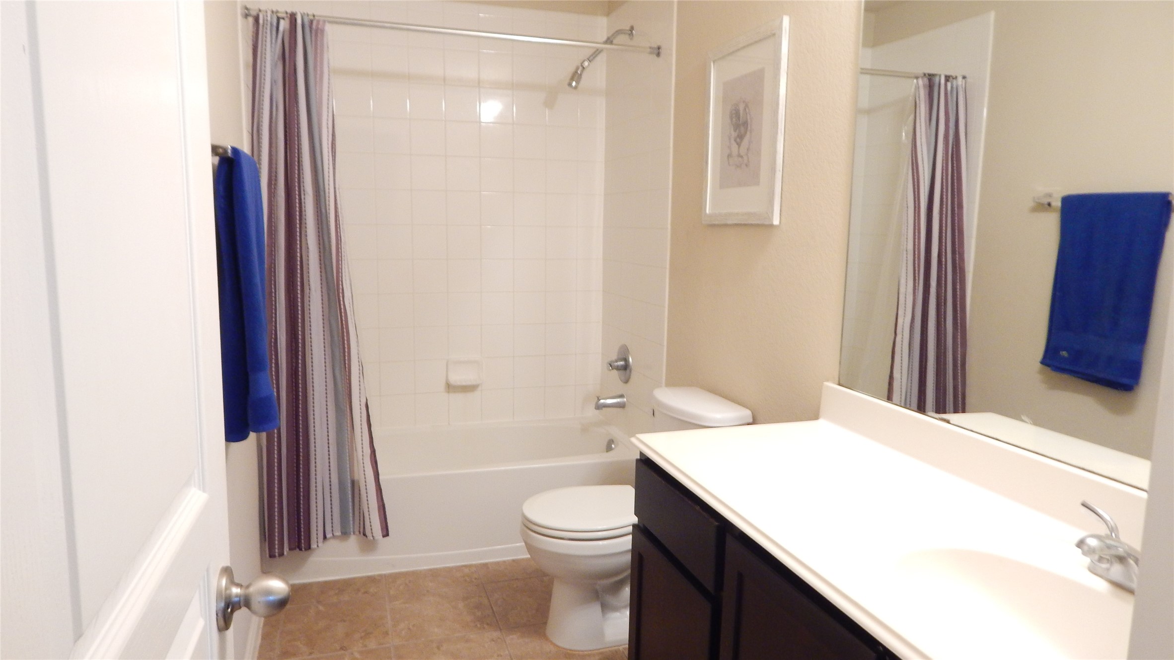 3219 Creole Bay Lane Rosenberg, TX 77471 - Photo 19 of 35 a bathroom with a sink a toilet a mirror and shower