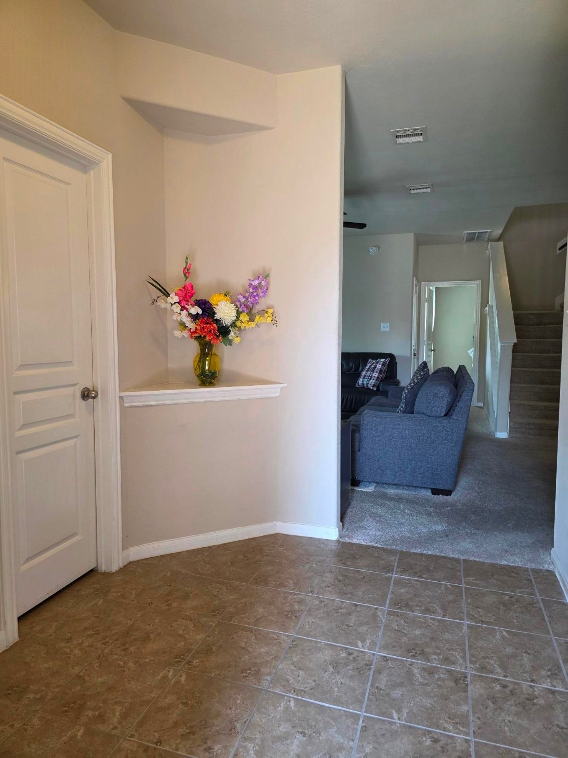 3219 Creole Bay Lane Rosenberg, TX 77471 - Photo 34 of 35 a living room with furniture and flowers
