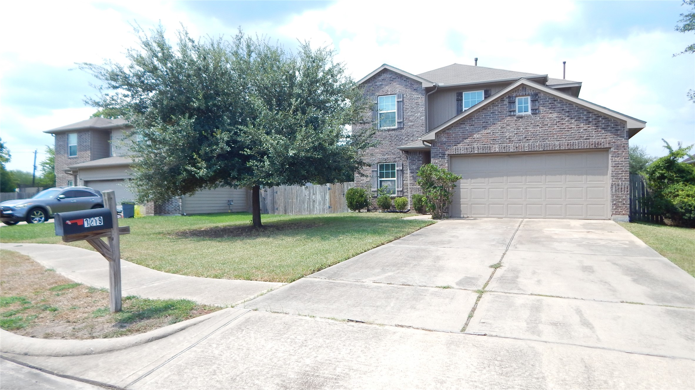 3219 Creole Bay Lane Rosenberg, TX 77471 - Photo 35 of 35 a front view of a house with a yard and trees