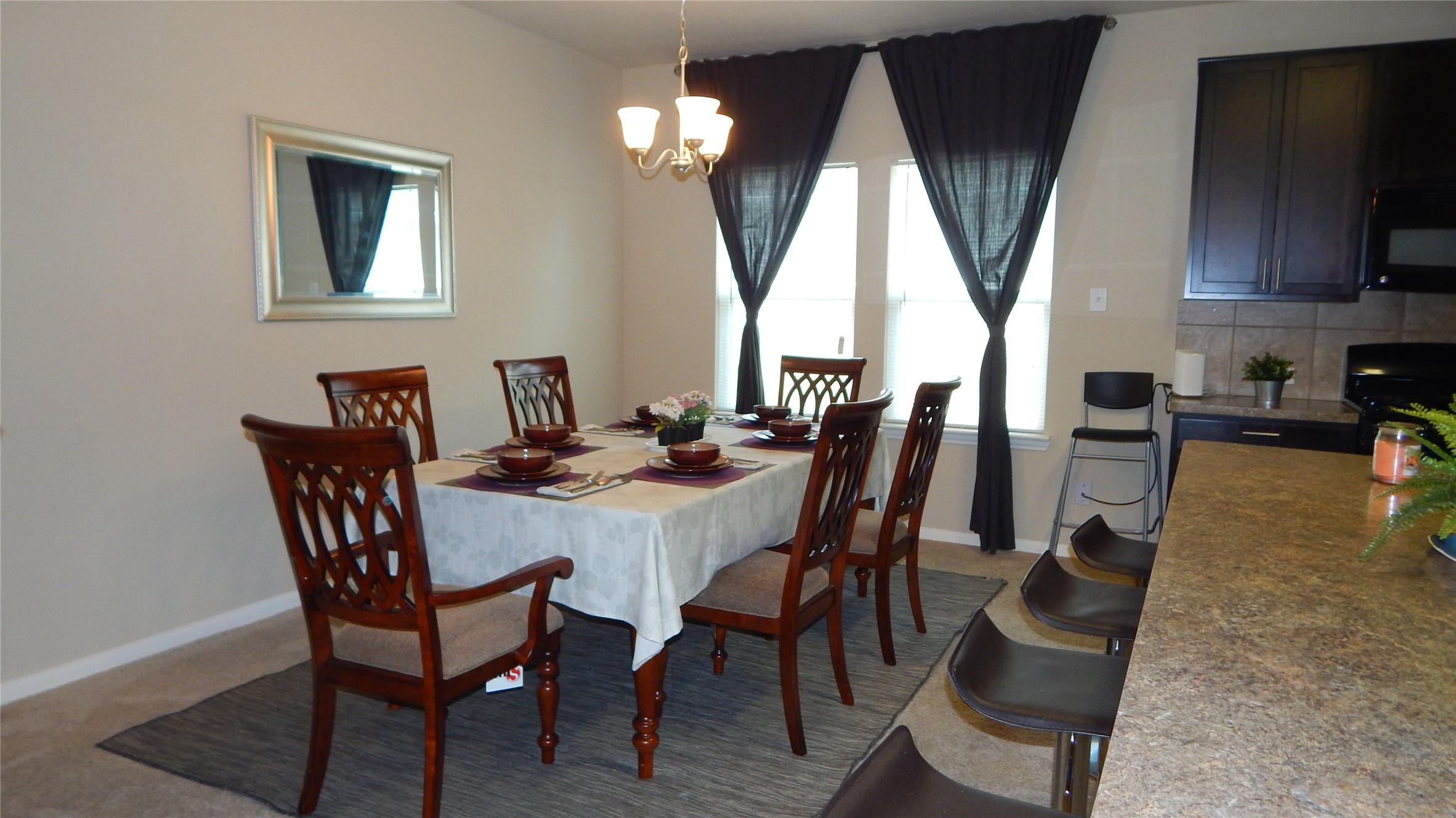 3219 Creole Bay Lane Rosenberg, TX 77471 - Photo 7 of 35 a view of a dining room with furniture and a large window