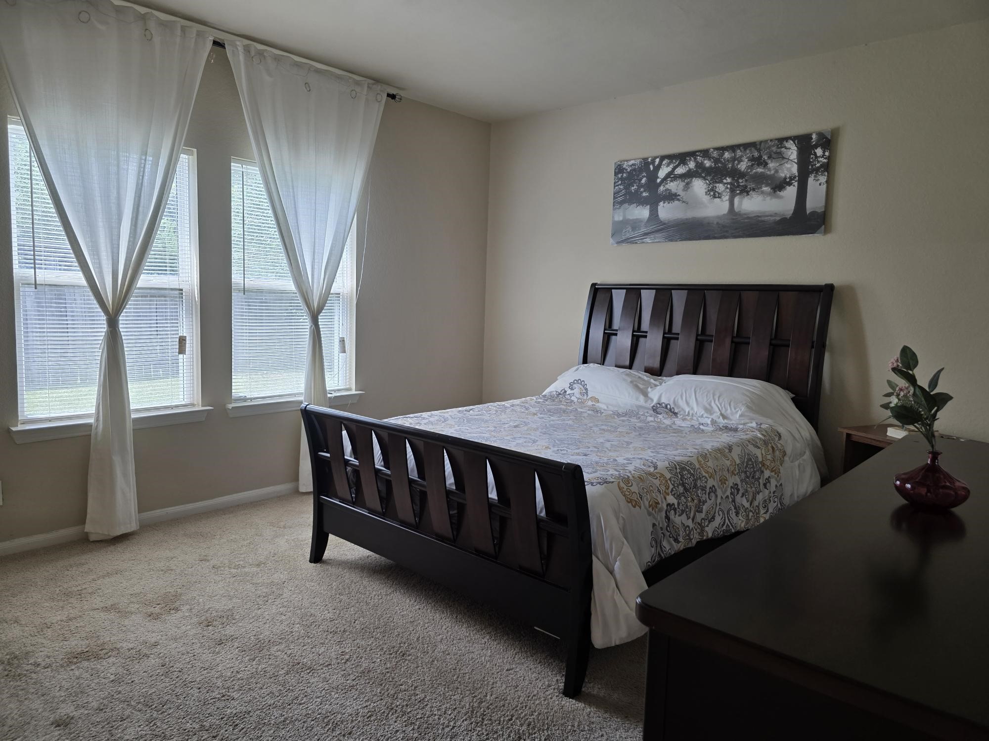 3219 Creole Bay Lane Rosenberg, TX 77471 - Photo 10 of 35 a bed sitting in a room next to a window