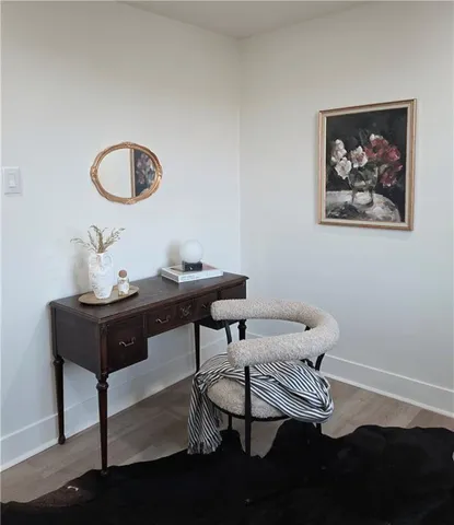 a view of a workspace with furniture