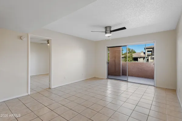 a view of a livingroom and a hallway