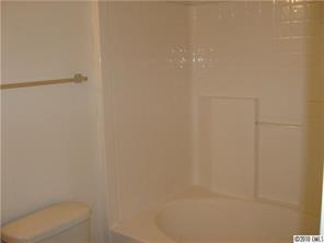 3040 Rockingham Court Southwest Concord, NC 28025 - Photo 8 of 14 a bathroom with a shower