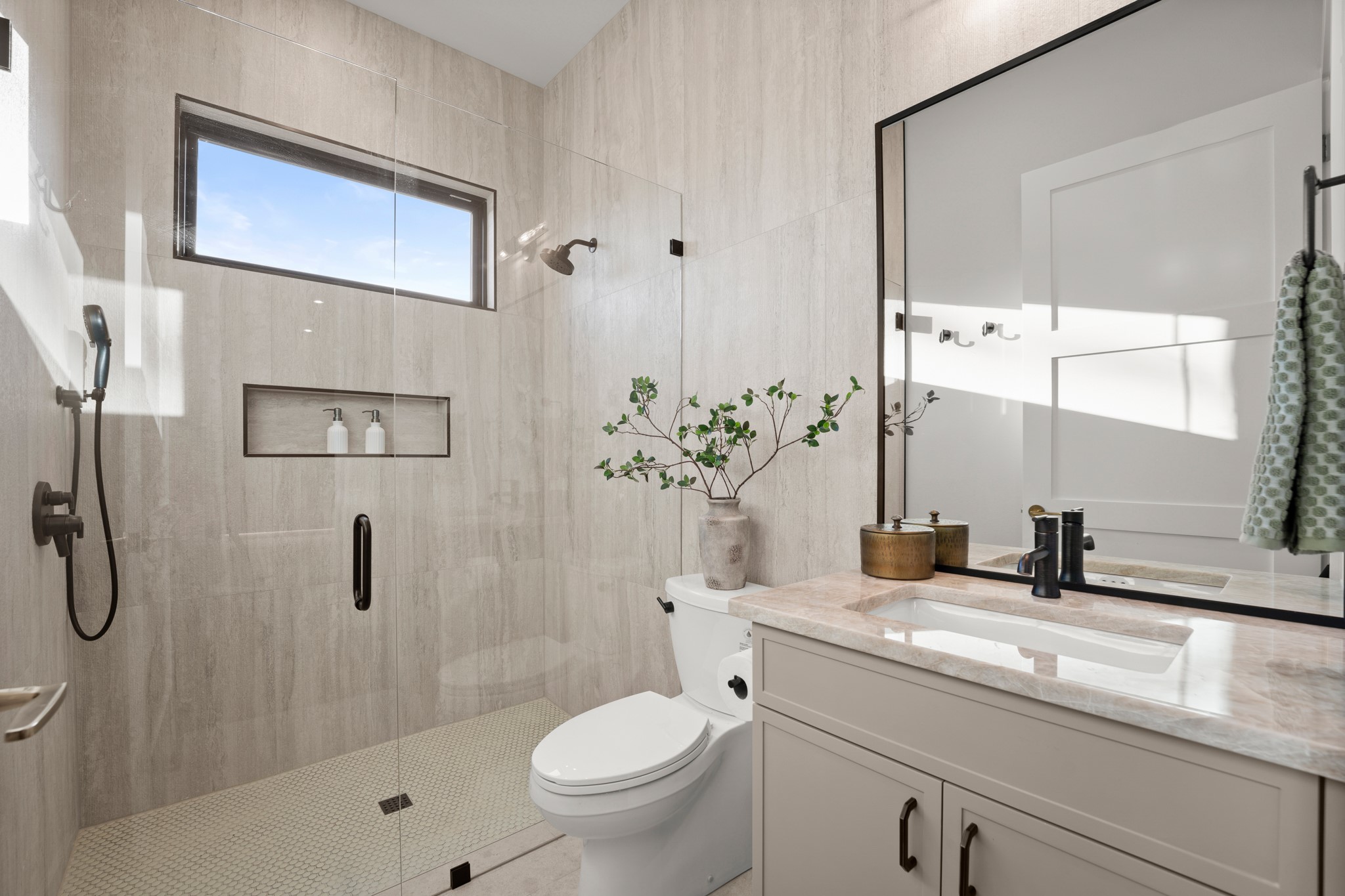 7706 Rutgers Avenue Austin, TX 78757 - Photo 9 of 35 Bathroom featuring vanity and a shower stall