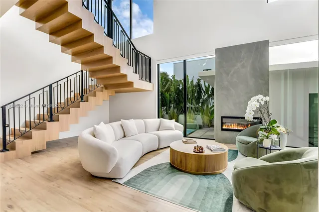 a bathroom with a toilet sink and shower
