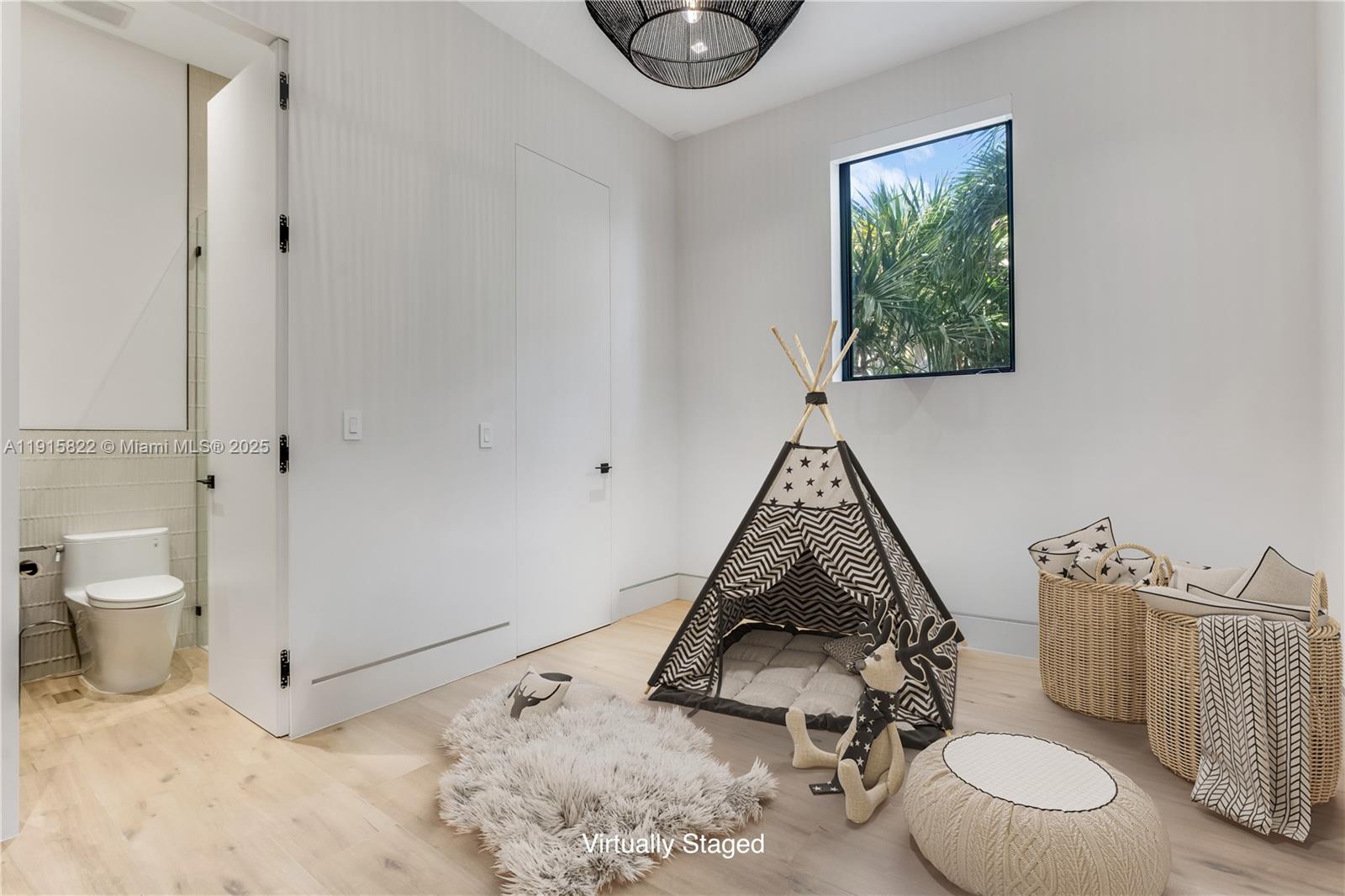 9045 Hawthorne Avenue Surfside, FL 33154 - Photo 21 of 61 a bathroom with a toilet