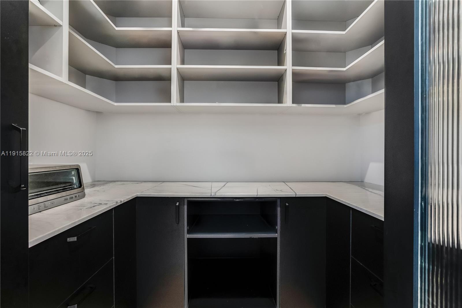 9045 Hawthorne Avenue Surfside, FL 33154 - Photo 26 of 61 a view of storage cabinets