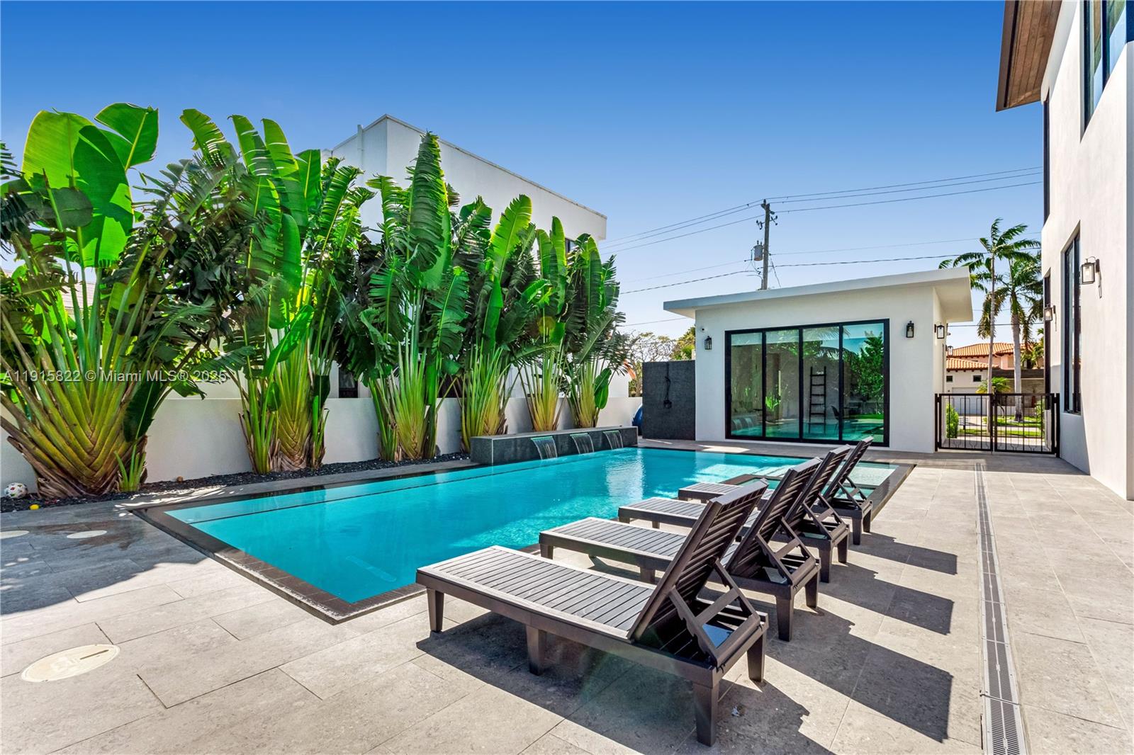 9045 Hawthorne Avenue Surfside, FL 33154 - Photo 3 of 61 a view of a backyard with sitting area