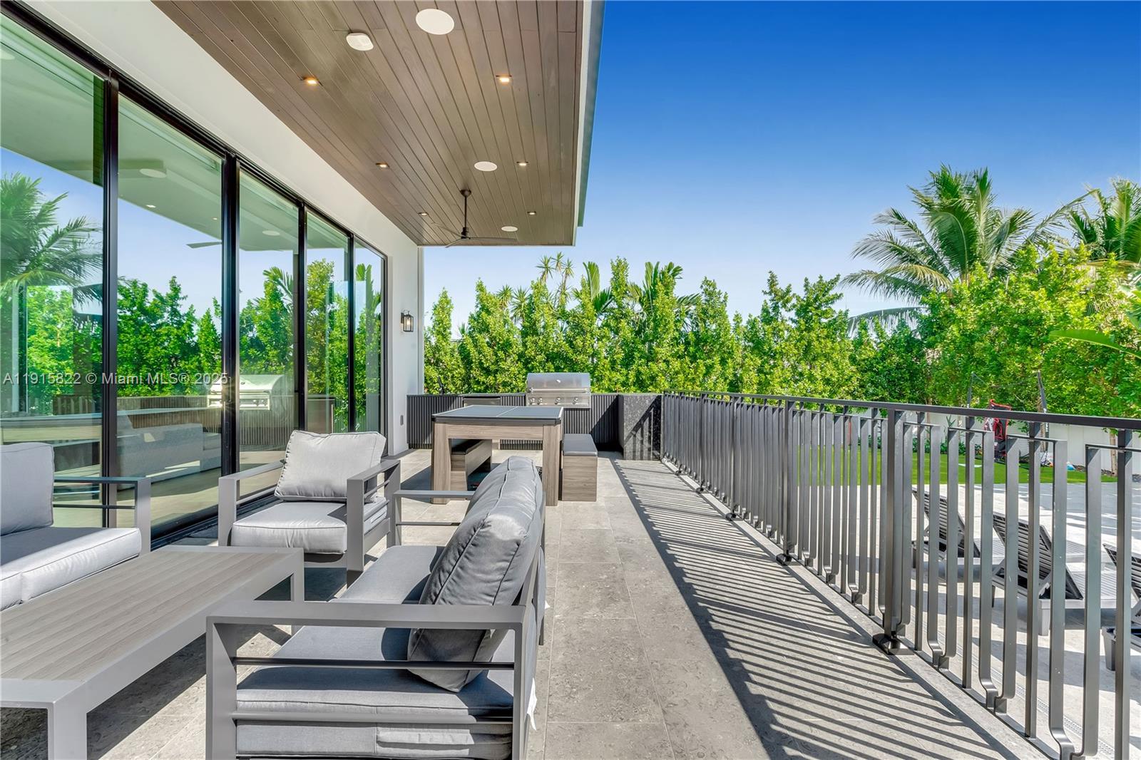 9045 Hawthorne Avenue Surfside, FL 33154 - Photo 33 of 61 a view of balcony with furniture and garden