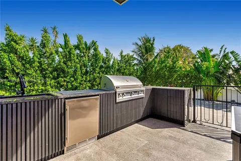 a bed room with a bed and a tv