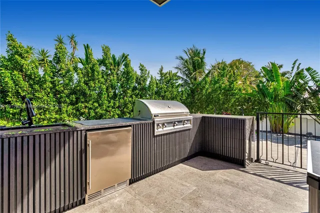 a bed room with a bed and a tv