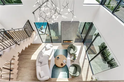 a bathroom with a granite countertop toilet a sink and a bathtub