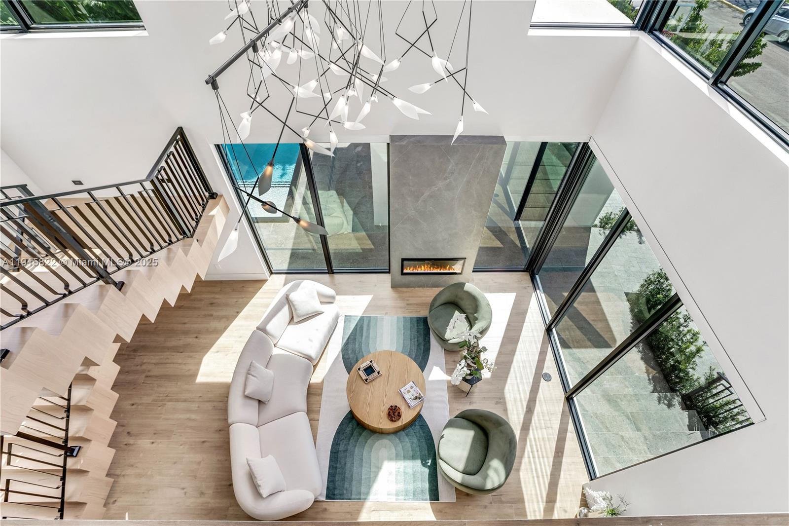 9045 Hawthorne Avenue Surfside, FL 33154 - Photo 35 of 61 a view of living room with furniture and a wooden floor