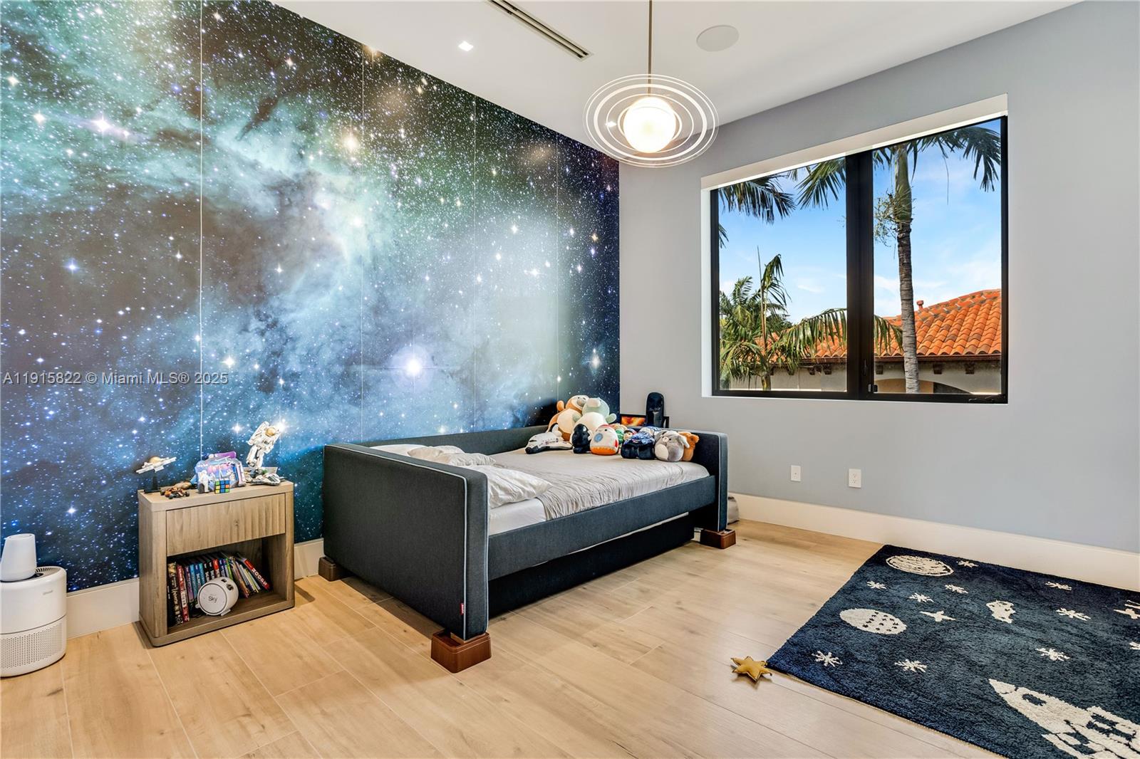 9045 Hawthorne Avenue Surfside, FL 33154 - Photo 42 of 61 a bed room with a bed and a tv