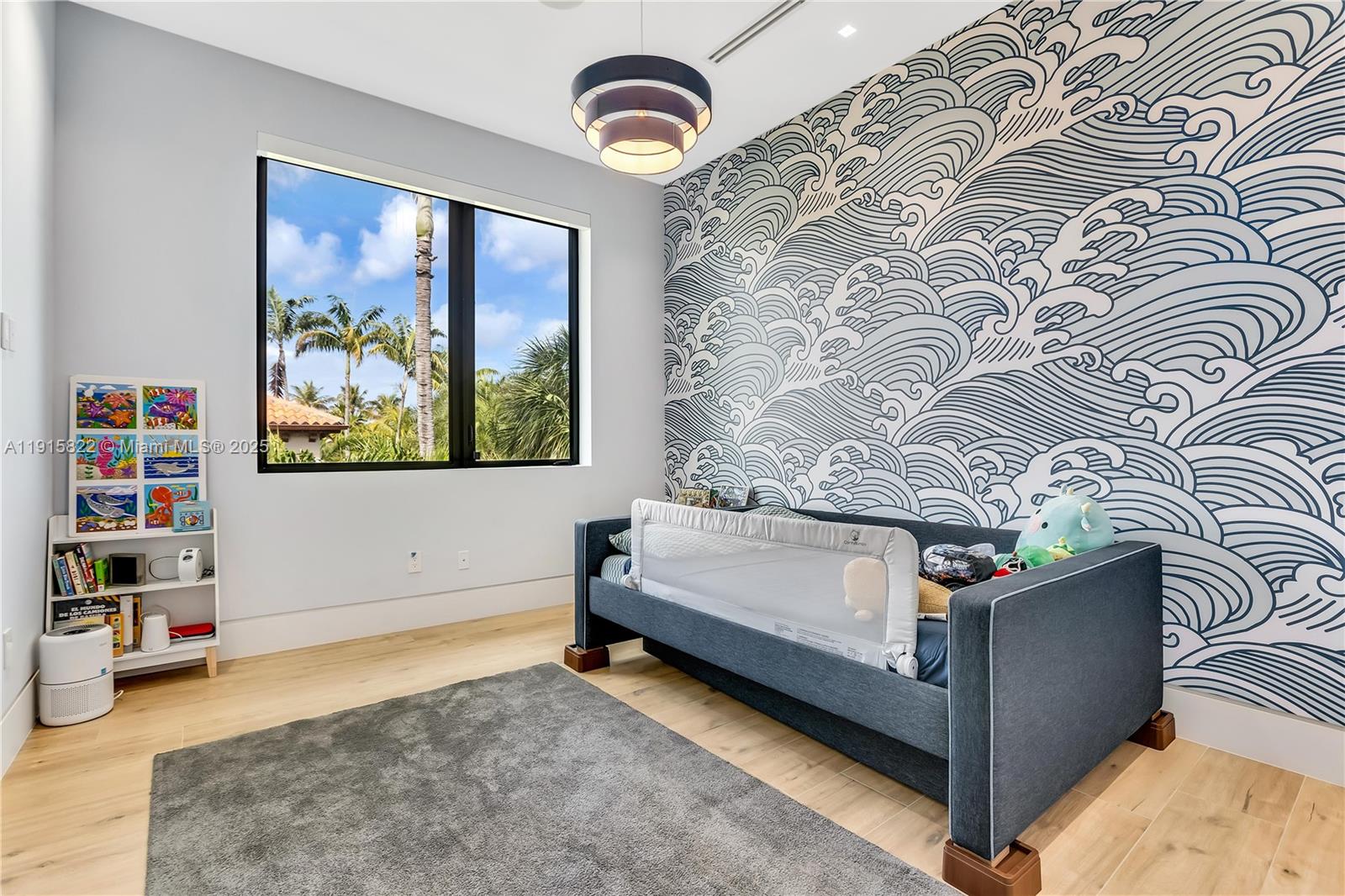 9045 Hawthorne Avenue Surfside, FL 33154 - Photo 44 of 61 a bedroom with a bed and a painting on the wall