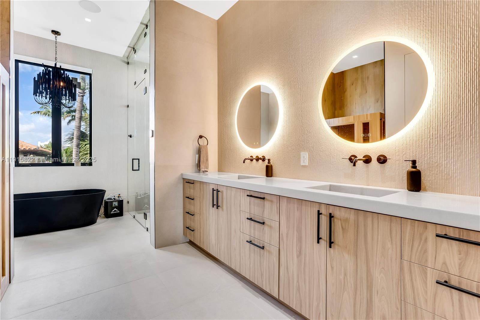 9045 Hawthorne Avenue Surfside, FL 33154 - Photo 53 of 61 a spacious bathroom with a double vanity sink double and mirror