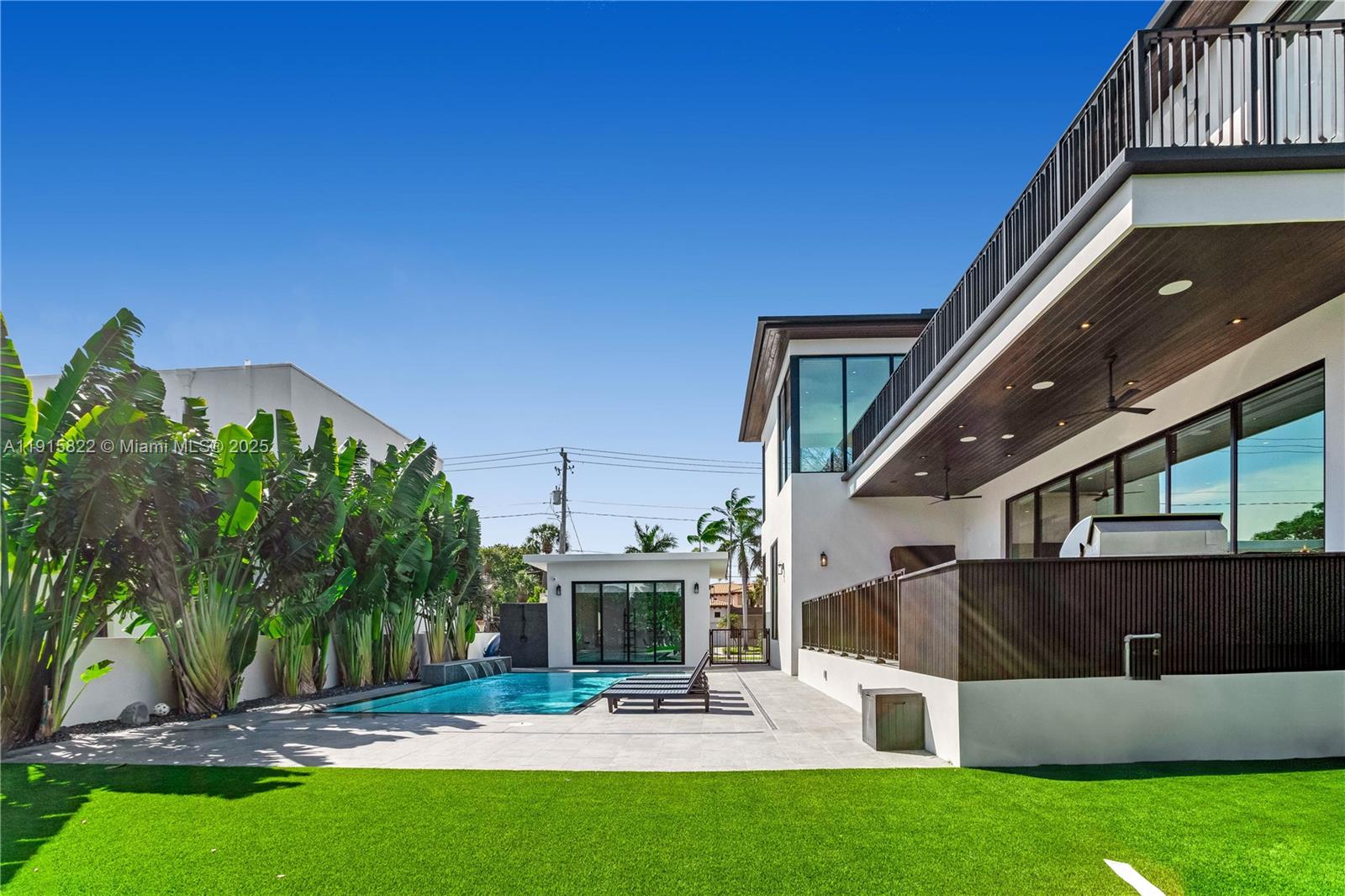9045 Hawthorne Avenue Surfside, FL 33154 - Photo 6 of 61 a view of outdoor space yard deck patio and fire pit