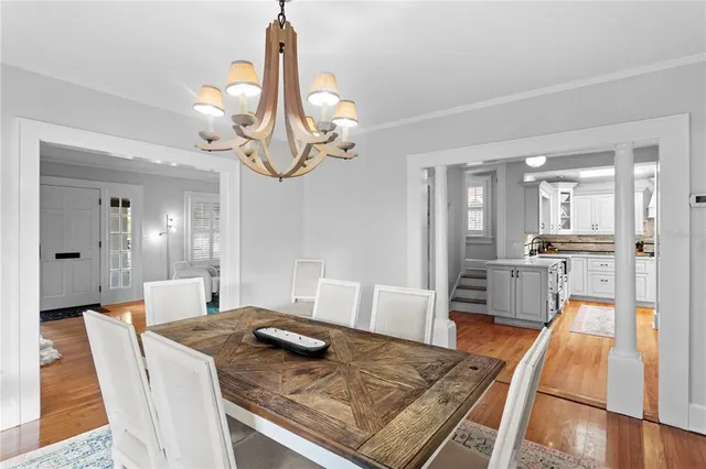 a view of a dining room and a wooden floor