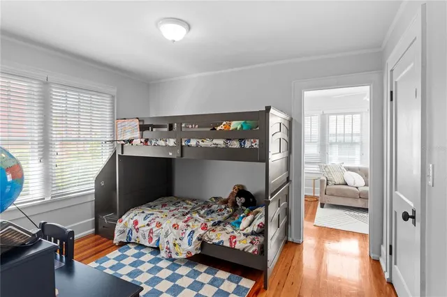 a bathroom with a granite countertop toilet sink and mirror