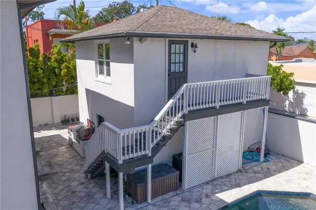 a kitchen with a sink cabinets and window