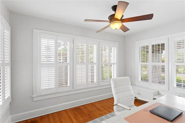 a living room with furniture and a window