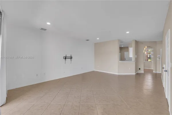 a bathroom with a sink vanity and a mirror