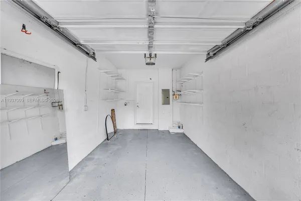 a view of a playground with basketball court