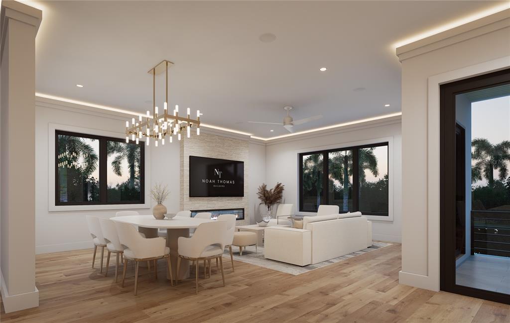302 176th Ave Circle Redington Shores, FL 33708 - Photo 5 of 8 a view of a dining room with furniture a chandelier and wooden floor