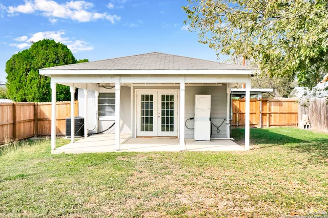 a house view with a garden space