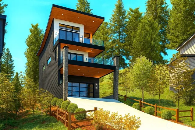 a view of a house with a yard