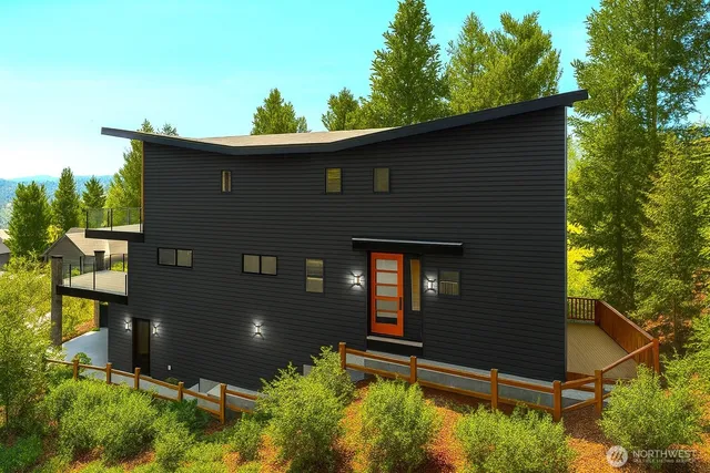 a backyard of a house with lots of green space