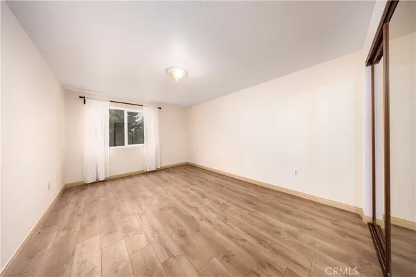 a utility room with cabinets washer and dryer