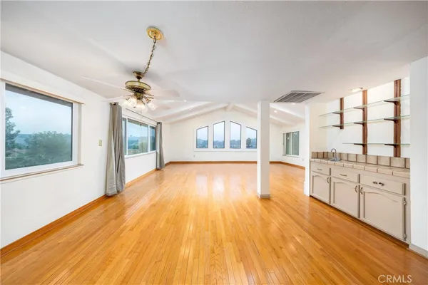 a bathroom with a sink a mirror and a bathtub