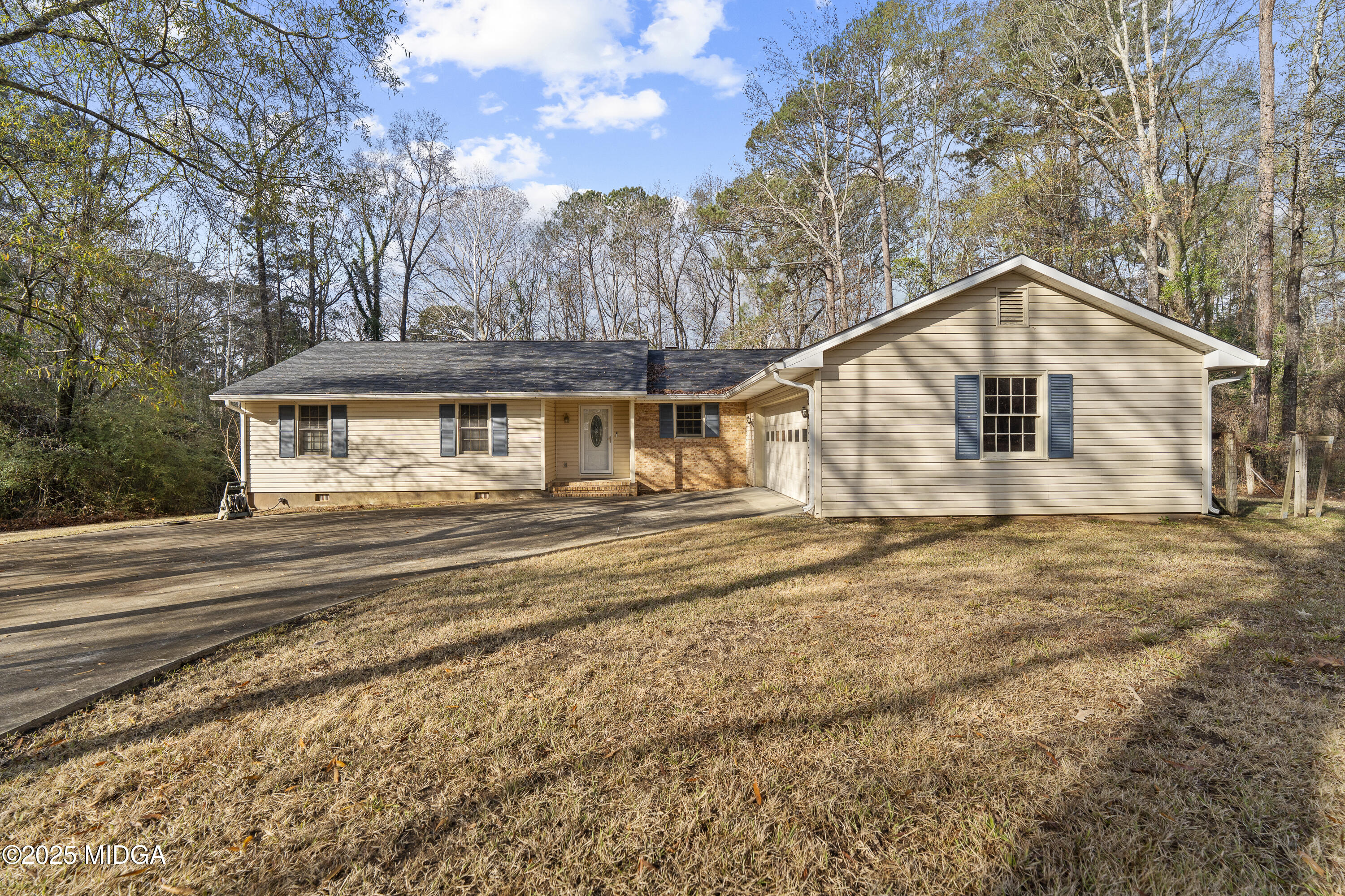 a house with trees in the background