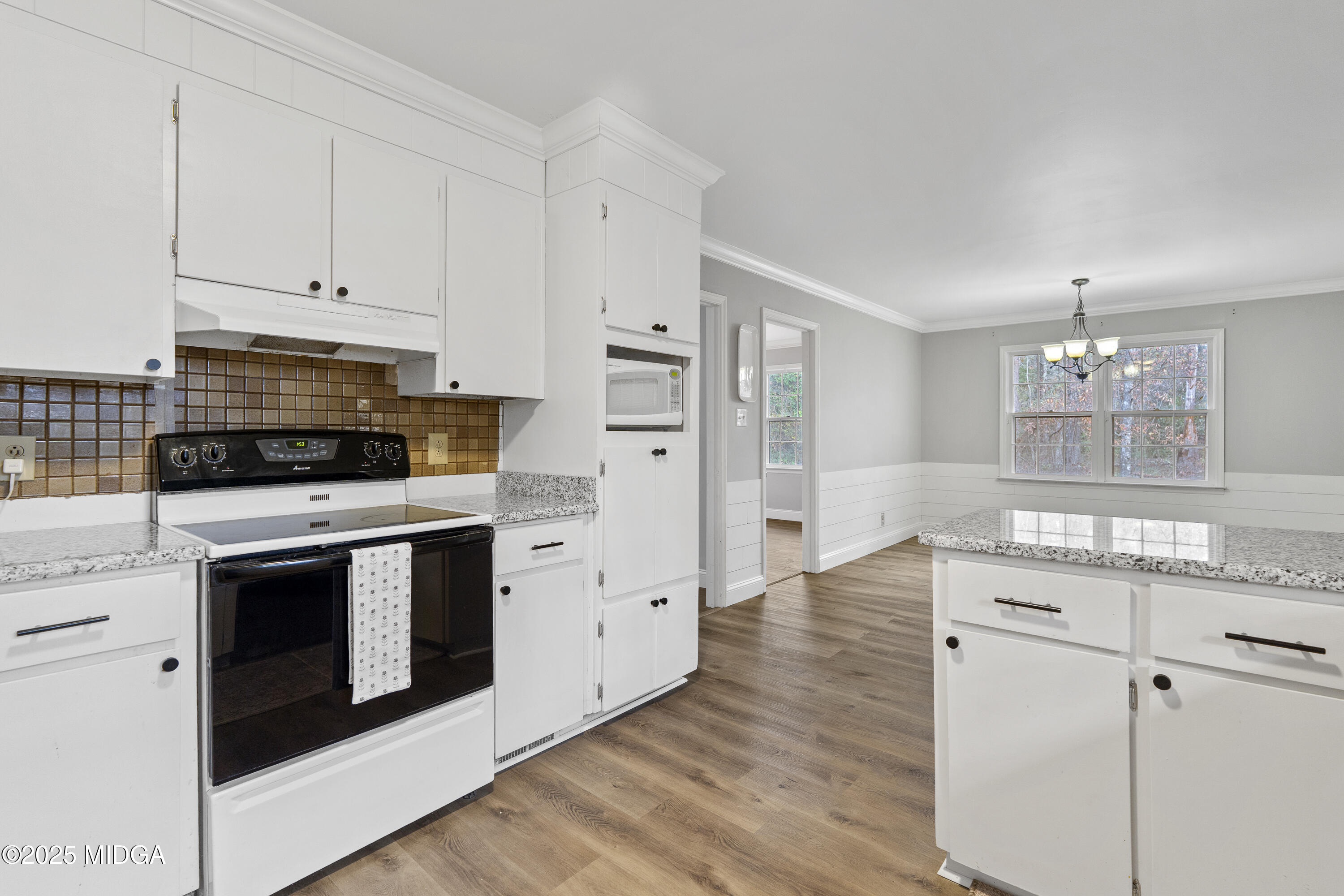 218 Matlock Lane Macon, GA 31210 - Photo 12 of 39 a kitchen with stainless steel appliances white cabinets and a sink
