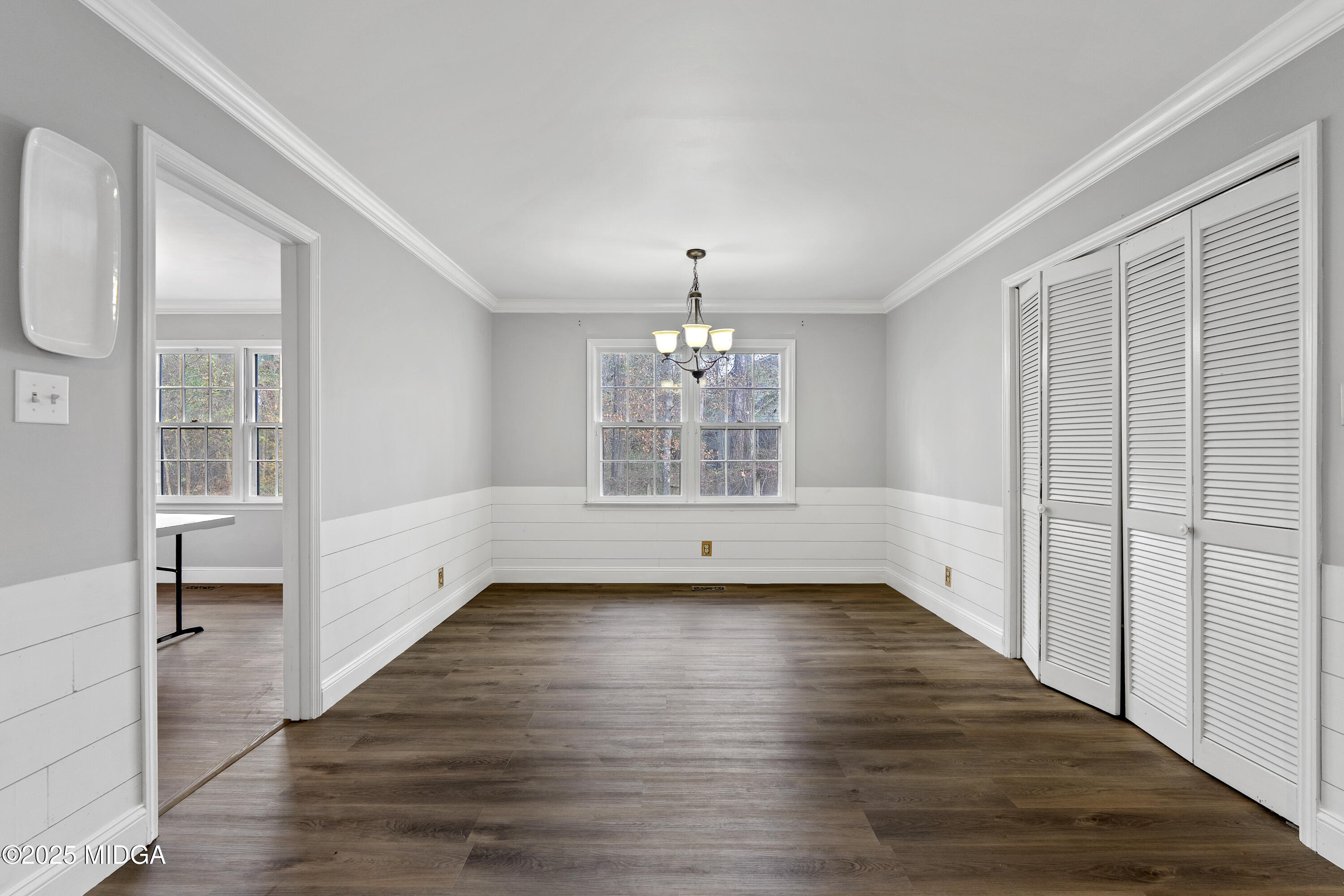 218 Matlock Lane Macon, GA 31210 - Photo 14 of 39 wooden floor in an empty room with a window