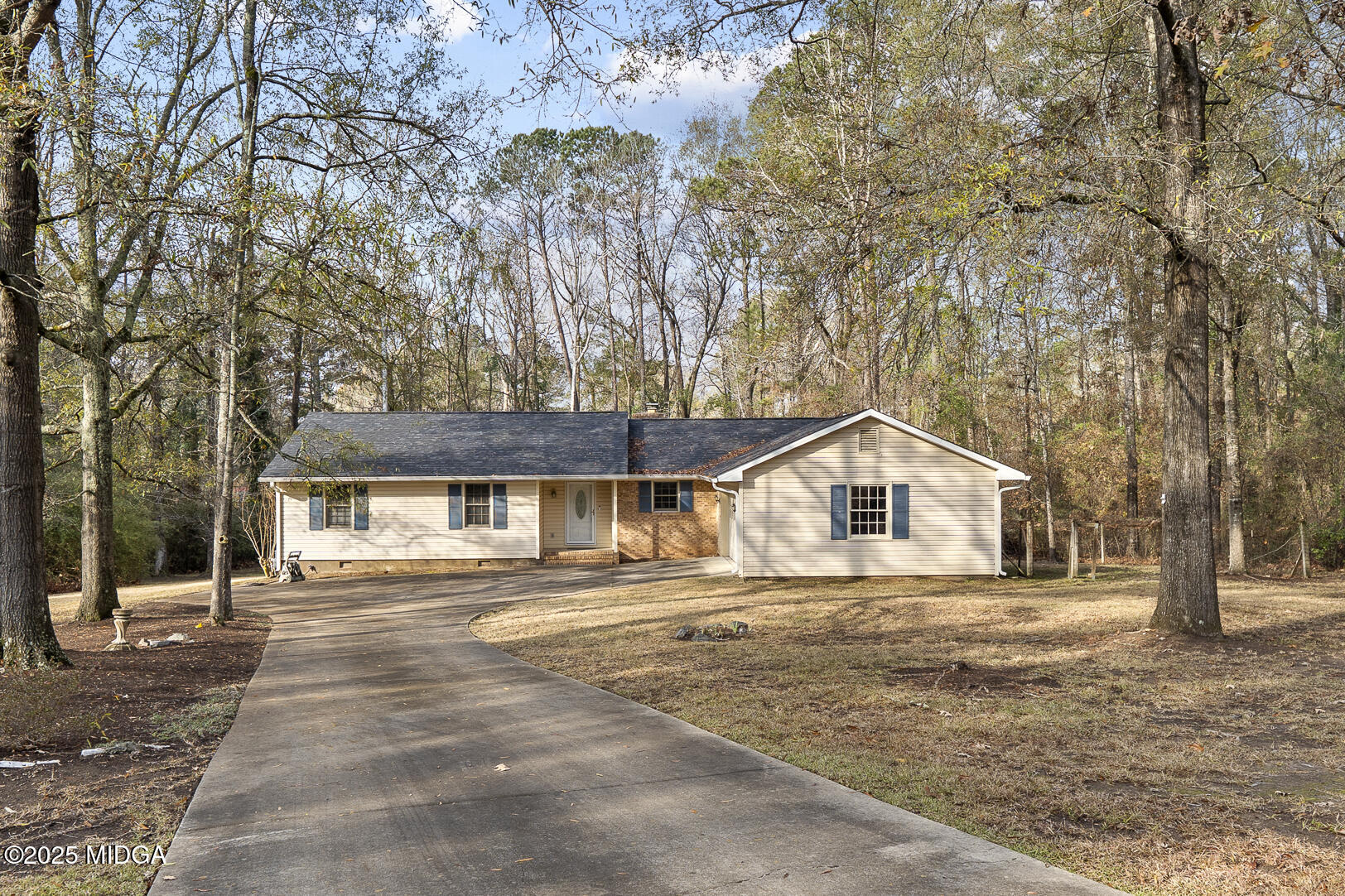218 Matlock Lane Macon, GA 31210 - Photo 2 of 39 a front view of a house with a yard