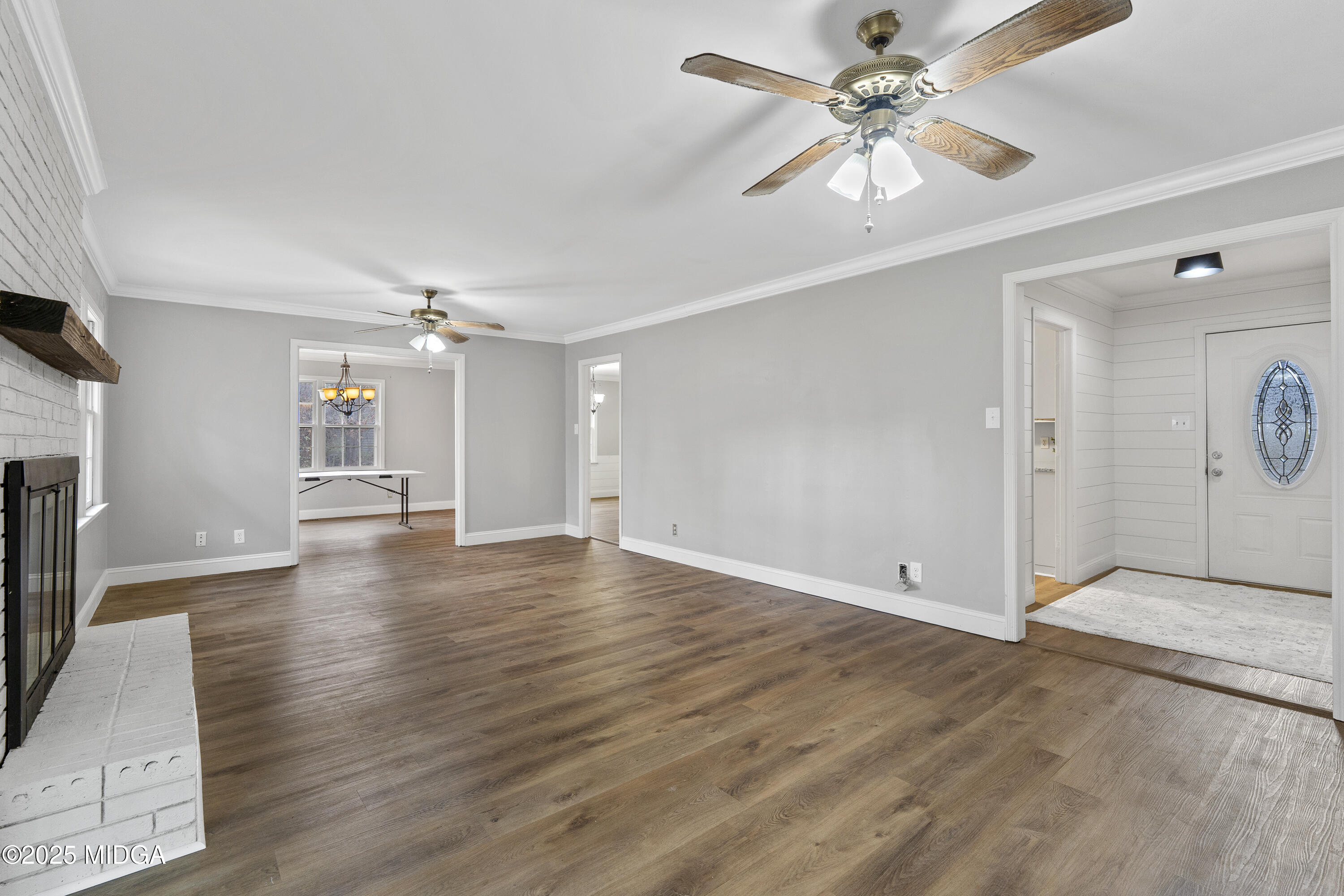 218 Matlock Lane Macon, GA 31210 - Photo 22 of 39 wooden floor in an empty room with a window