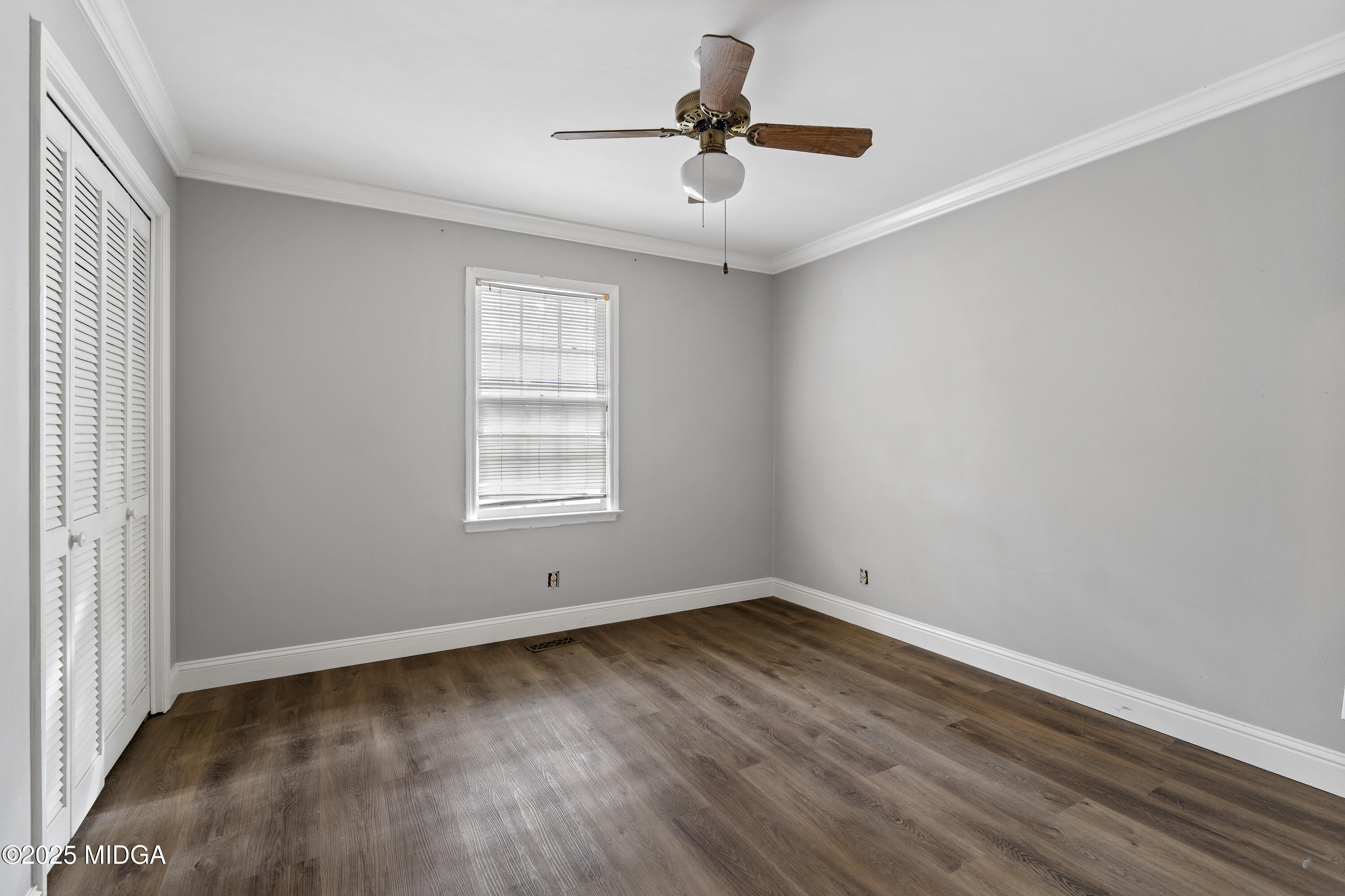 218 Matlock Lane Macon, GA 31210 - Photo 28 of 39 wooden floor in an empty room with a window