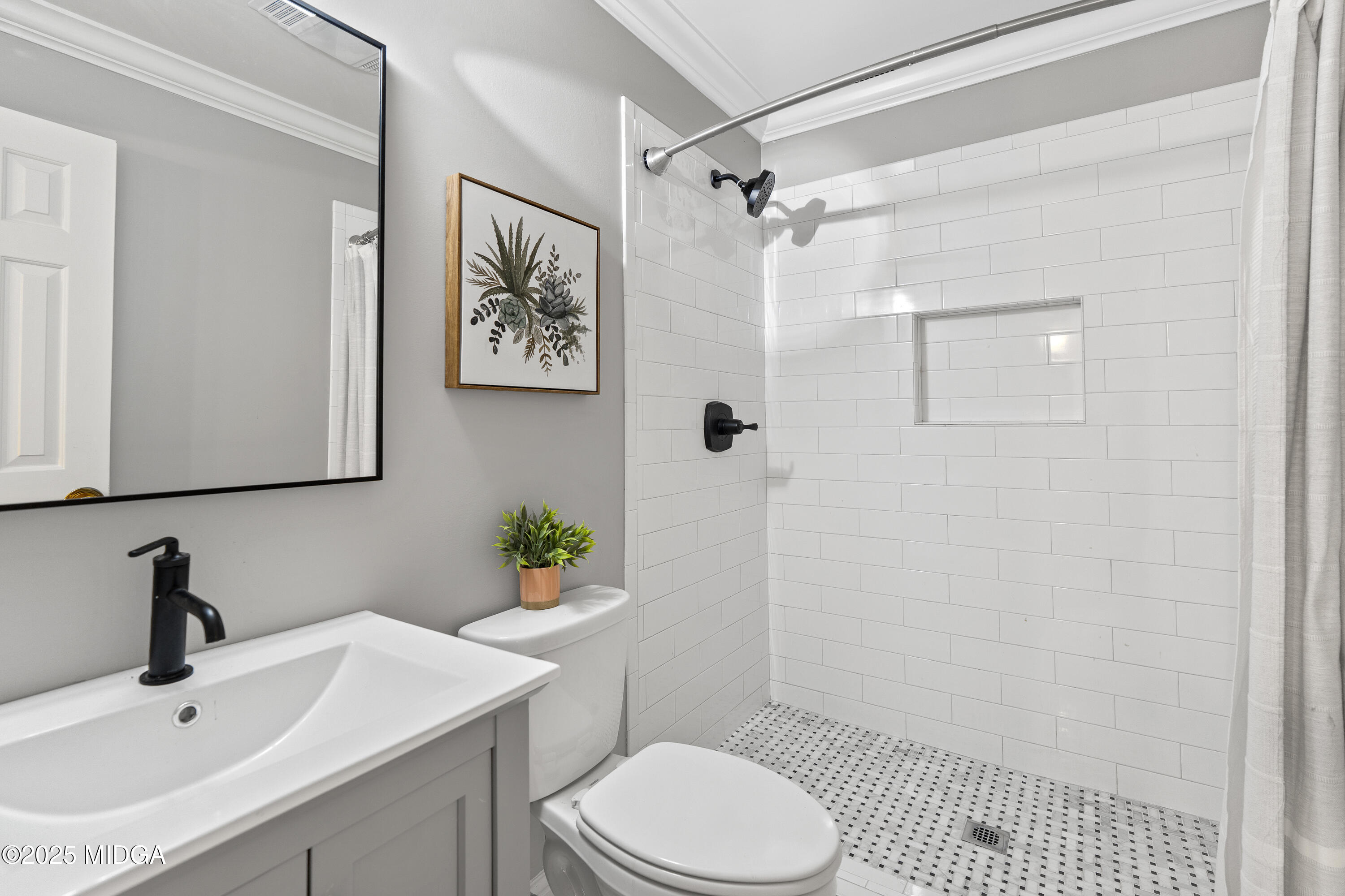 218 Matlock Lane Macon, GA 31210 - Photo 30 of 39 a bathroom with a sink toilet and shower