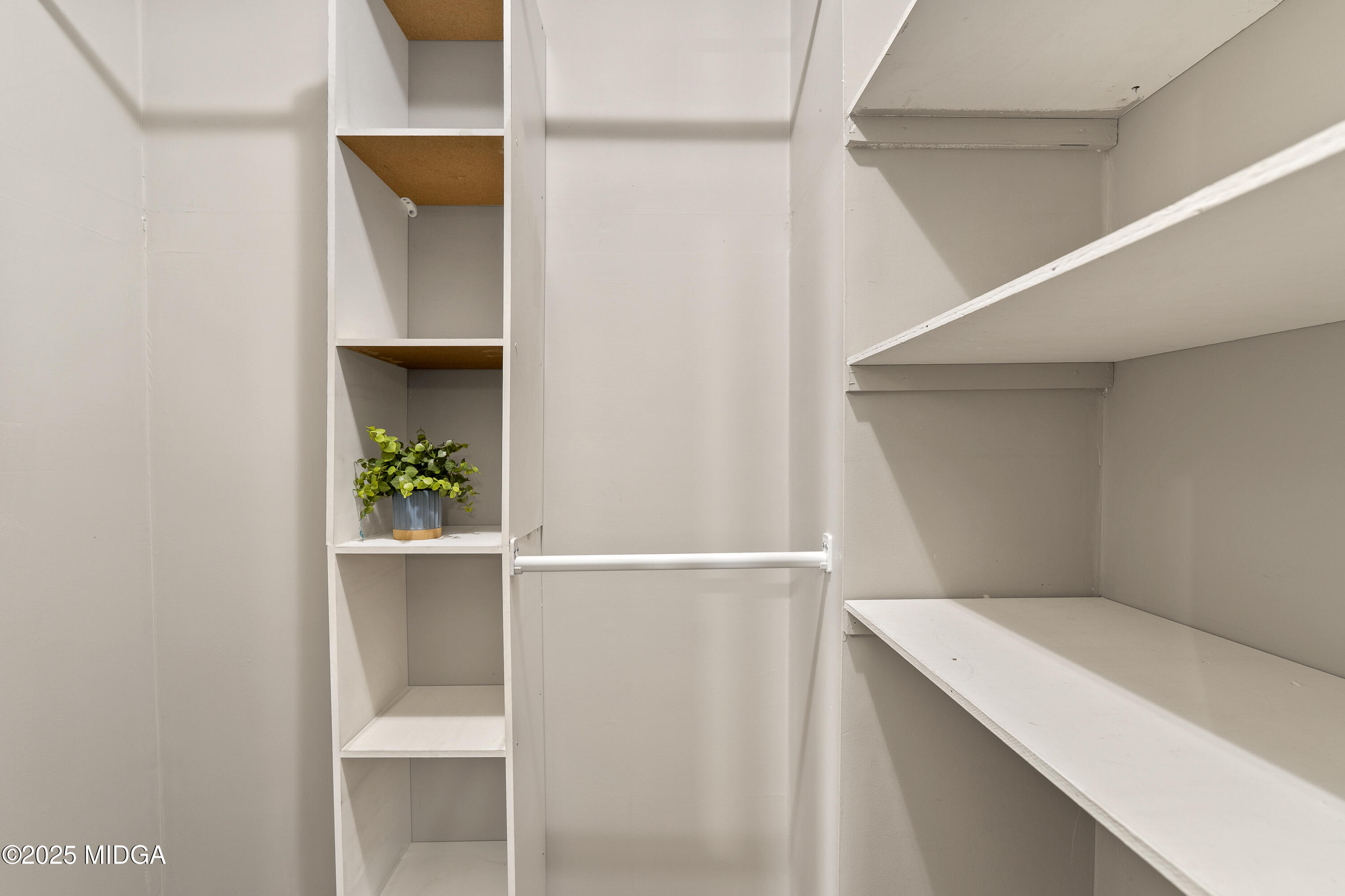 218 Matlock Lane Macon, GA 31210 - Photo 32 of 39 a hallway with table and potted plants