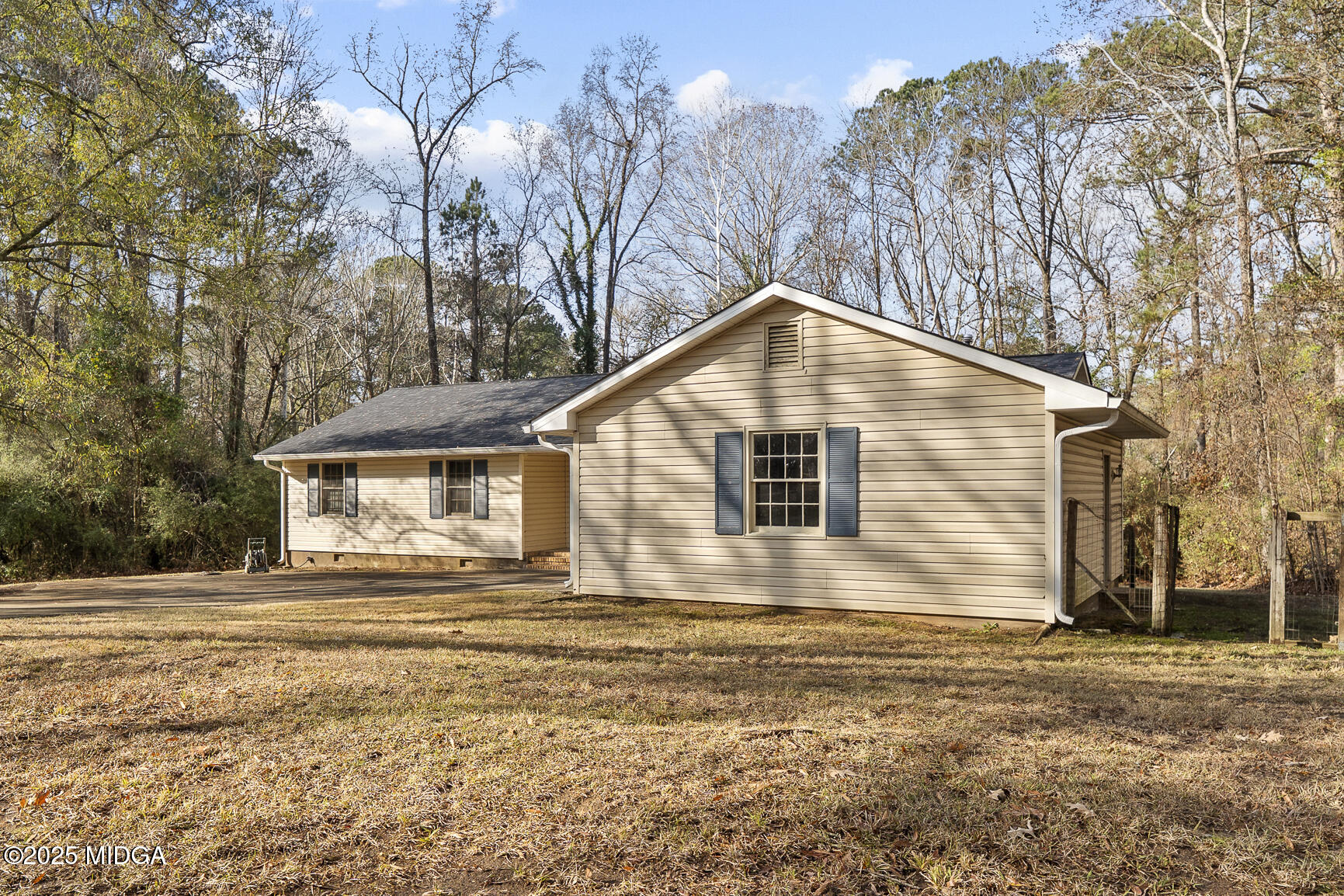 218 Matlock Lane Macon, GA 31210 - Photo 4 of 39 a front view of a house with a yard