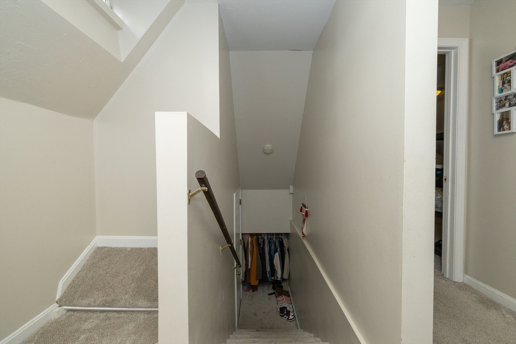35 May Street Worcester, MA 01610 - Photo 17 of 30 a view of a hallway with staircase